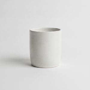 A white ceramic mug on a white background